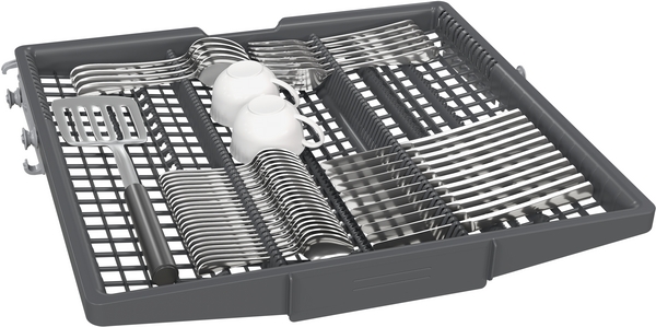 Tiroir de lave-vaisselle rempli de couverts et tasses