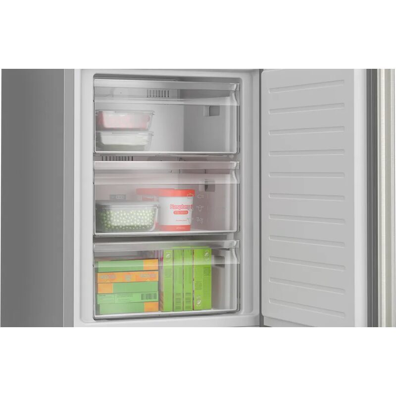 Congélateur ouvert avec aliments surgelés rangés