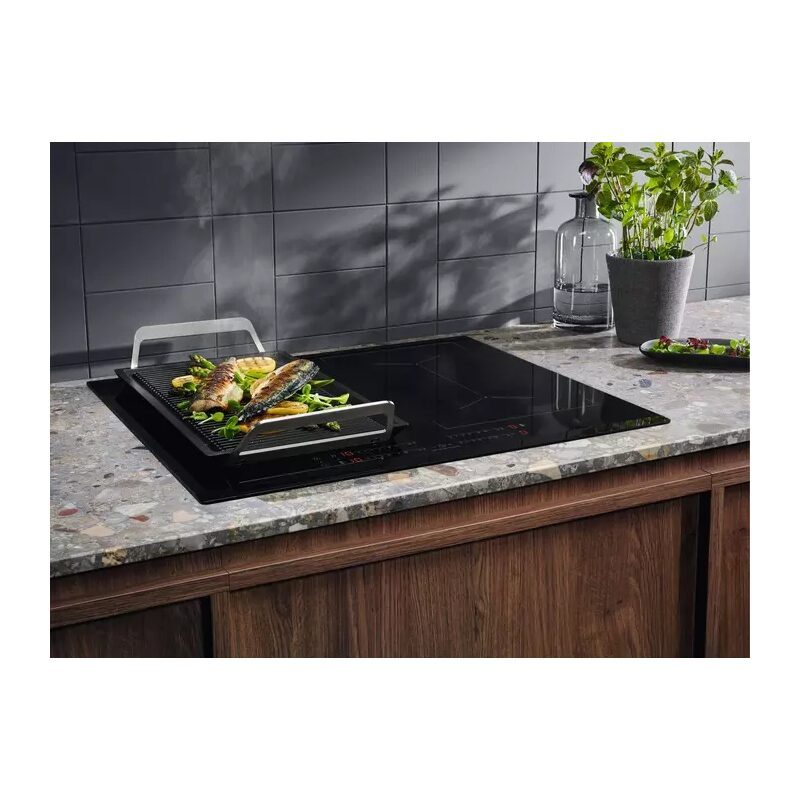 Plaque induction moderne avec grillade de poisson