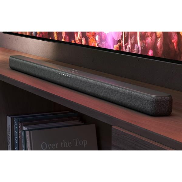 Barre de son noire sous un téléviseur