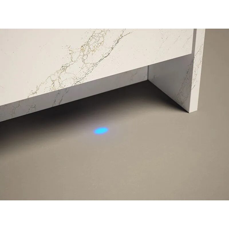 Lumière bleue sous un meuble moderne