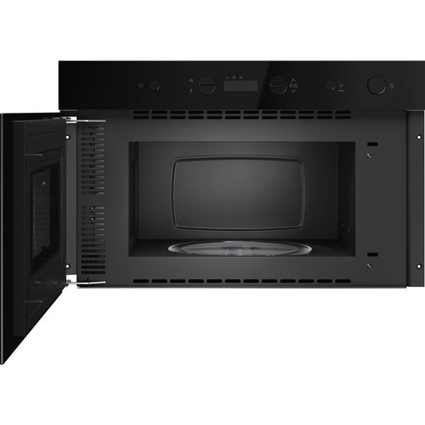 Four micro-ondes noir porte ouverte