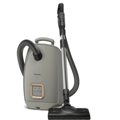 Aspirateur traîneau gris avec flexible et embout brosse
