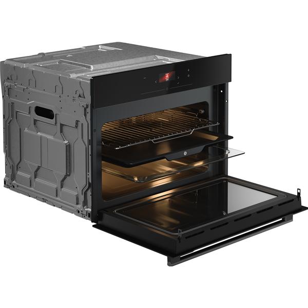 Four encastrable moderne avec porte ouverte