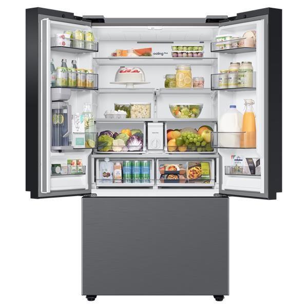 Réfrigérateur moderne ouvert rempli d’aliments variés