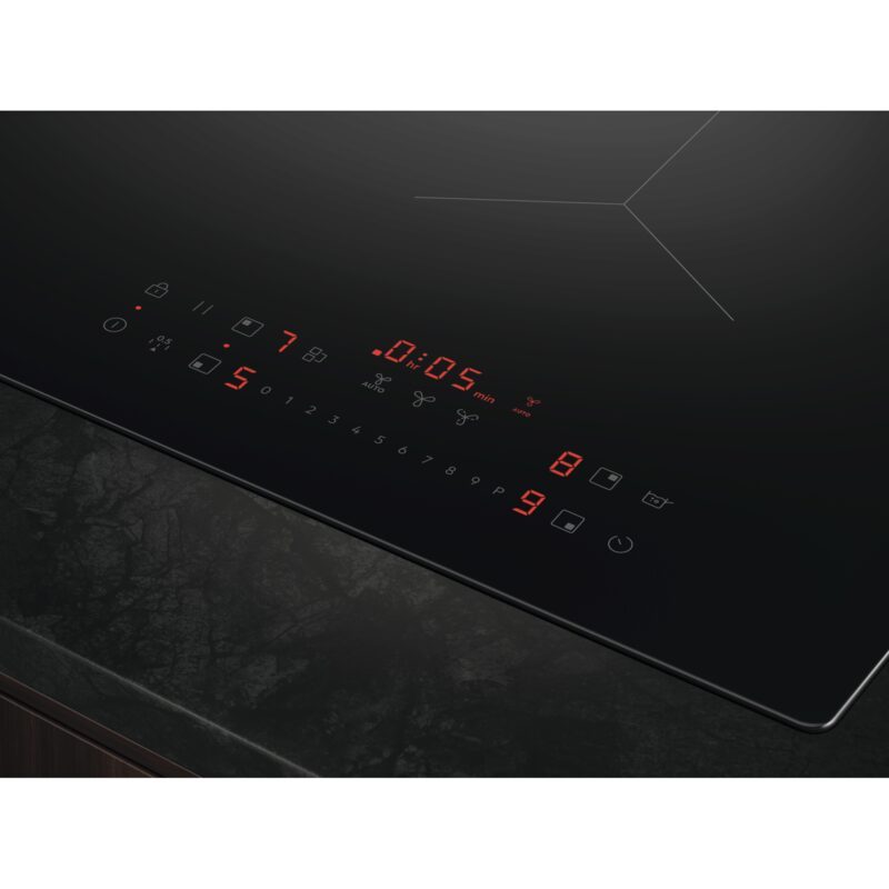 Plaque à induction moderne avec commandes tactiles rouges