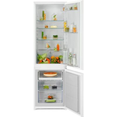 Réfrigérateur ouvert avec aliments et boissons variés