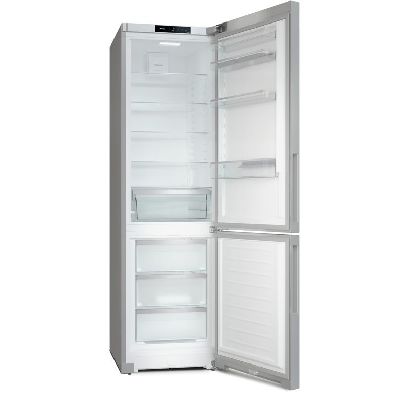 Réfrigérateur congélateur combiné porte ouverte vide